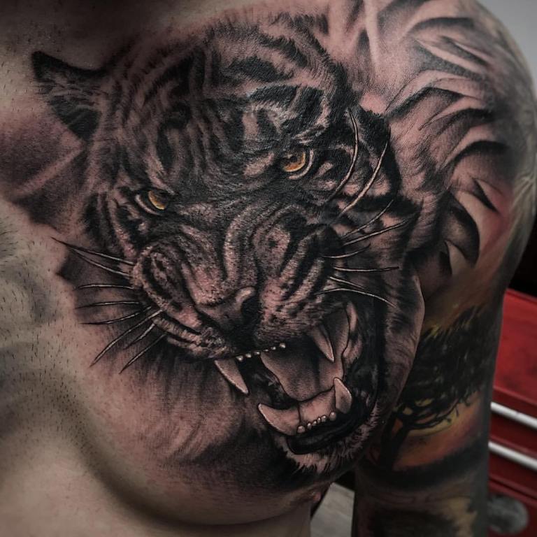 Татуировка тигра мужская