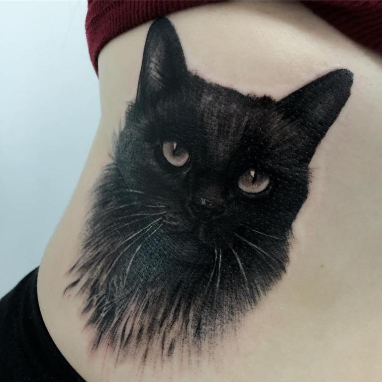 значение татуировки кошка