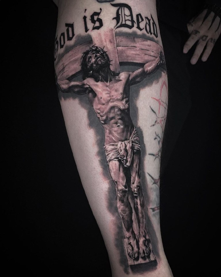 Татуировка Иисуса Христа распятым