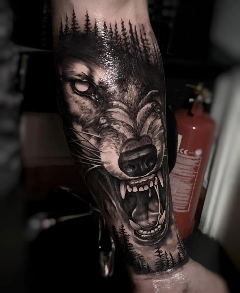 Татуировка оскал волка